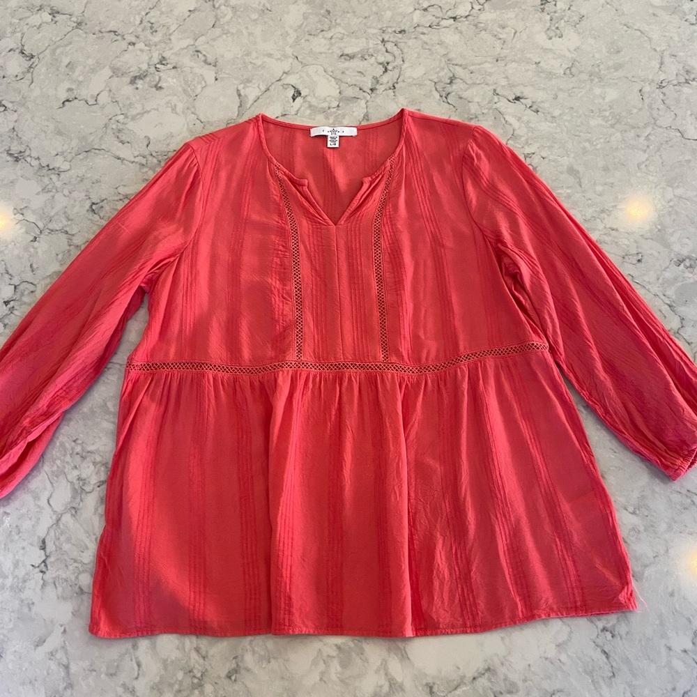 Pink peplum top with cutout detailing size L